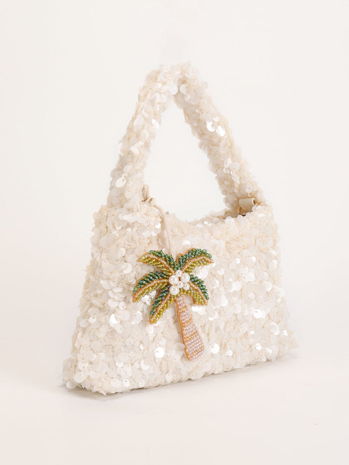 Iza | Bolso de lentejuelas con colgante de palmera